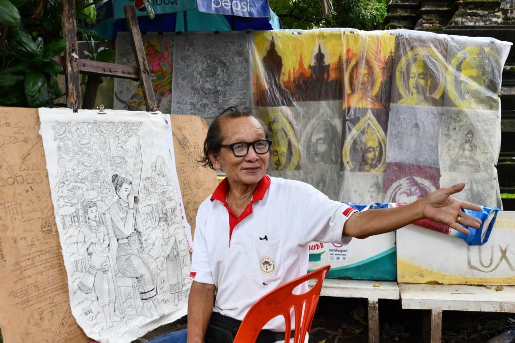 ラオスの象徴で、三年間絵を描き続ける男性